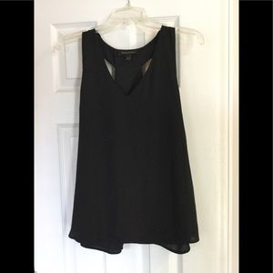 Swing tank top